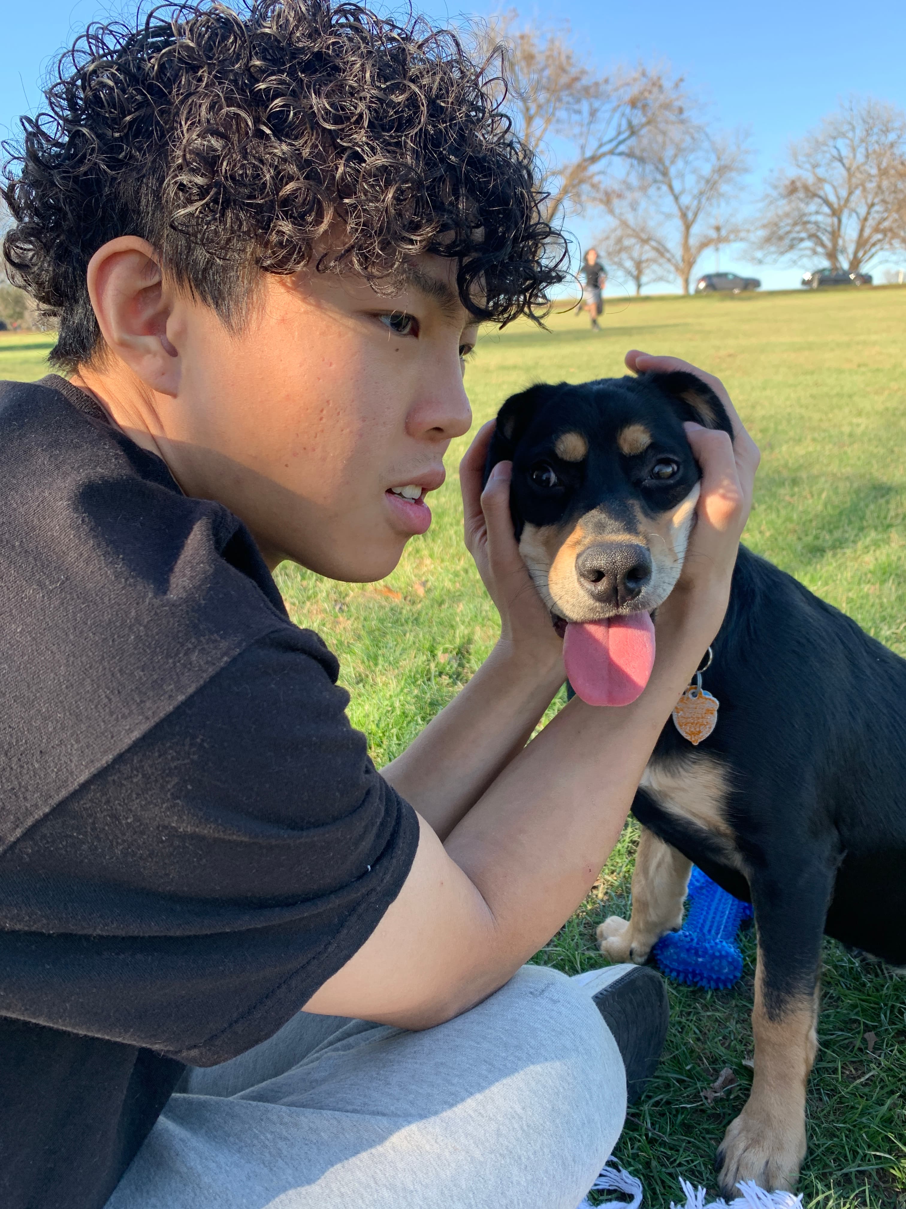 Yujie smiling with Brownie